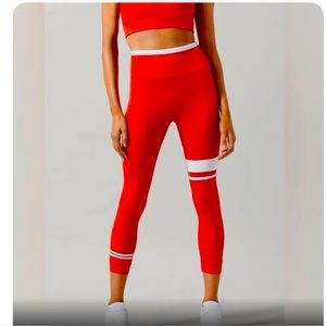 Lilybod red women’s small leggings. White stripe. $98